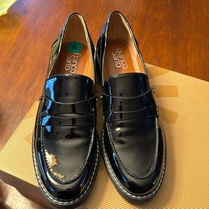 Franco Sarto black patent leather penny loafers.